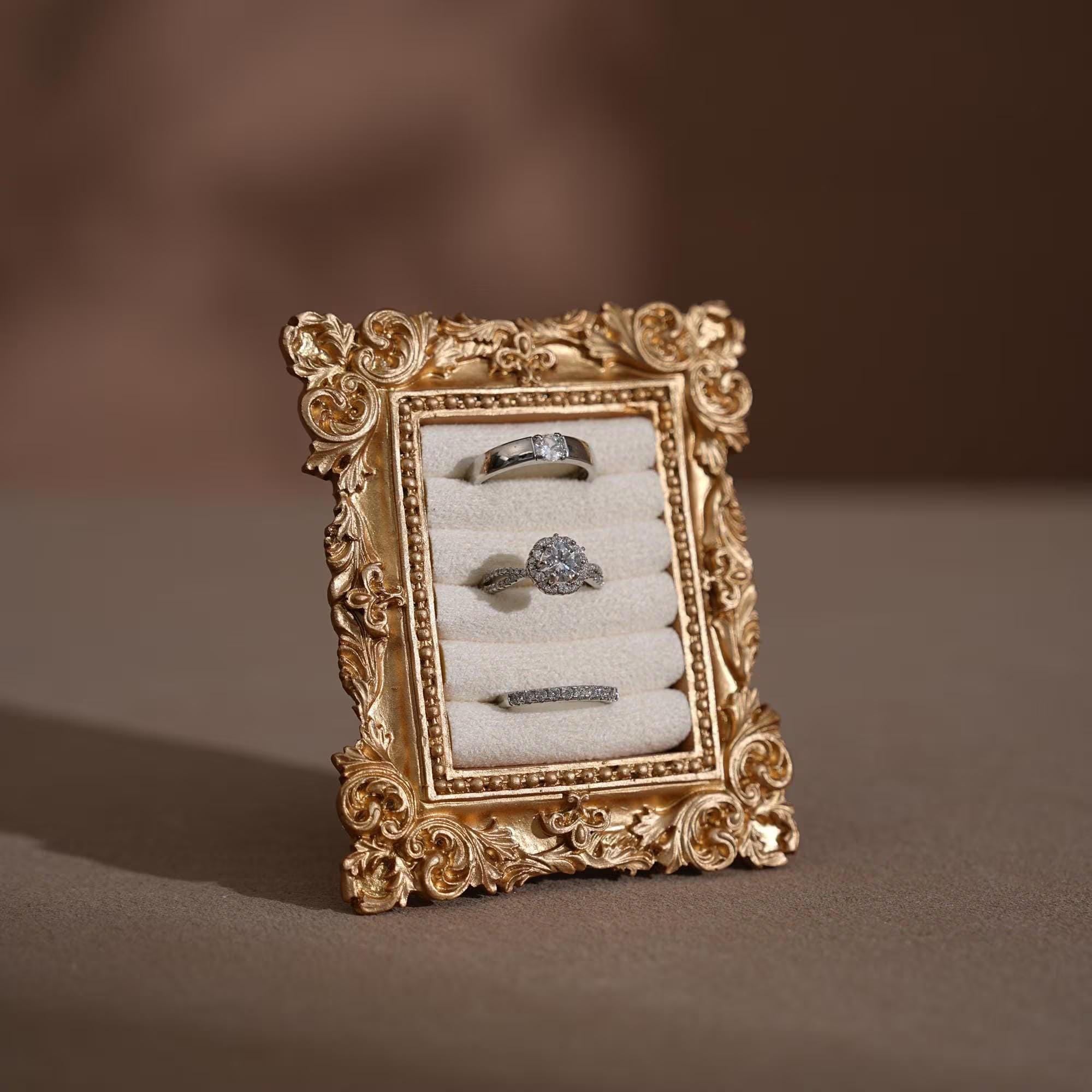 Vintage-inspired engagement ring stand gift for wedding flat lay ...